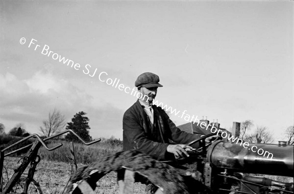 FARM SCENE AT CONROY'S TRACTOR PLOUGHING